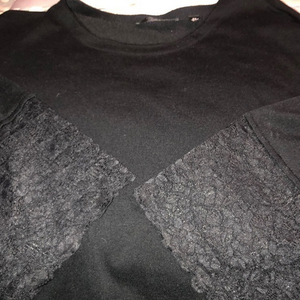 Size 2X black knit sweater with black lace around‎ the arm straight Hemline